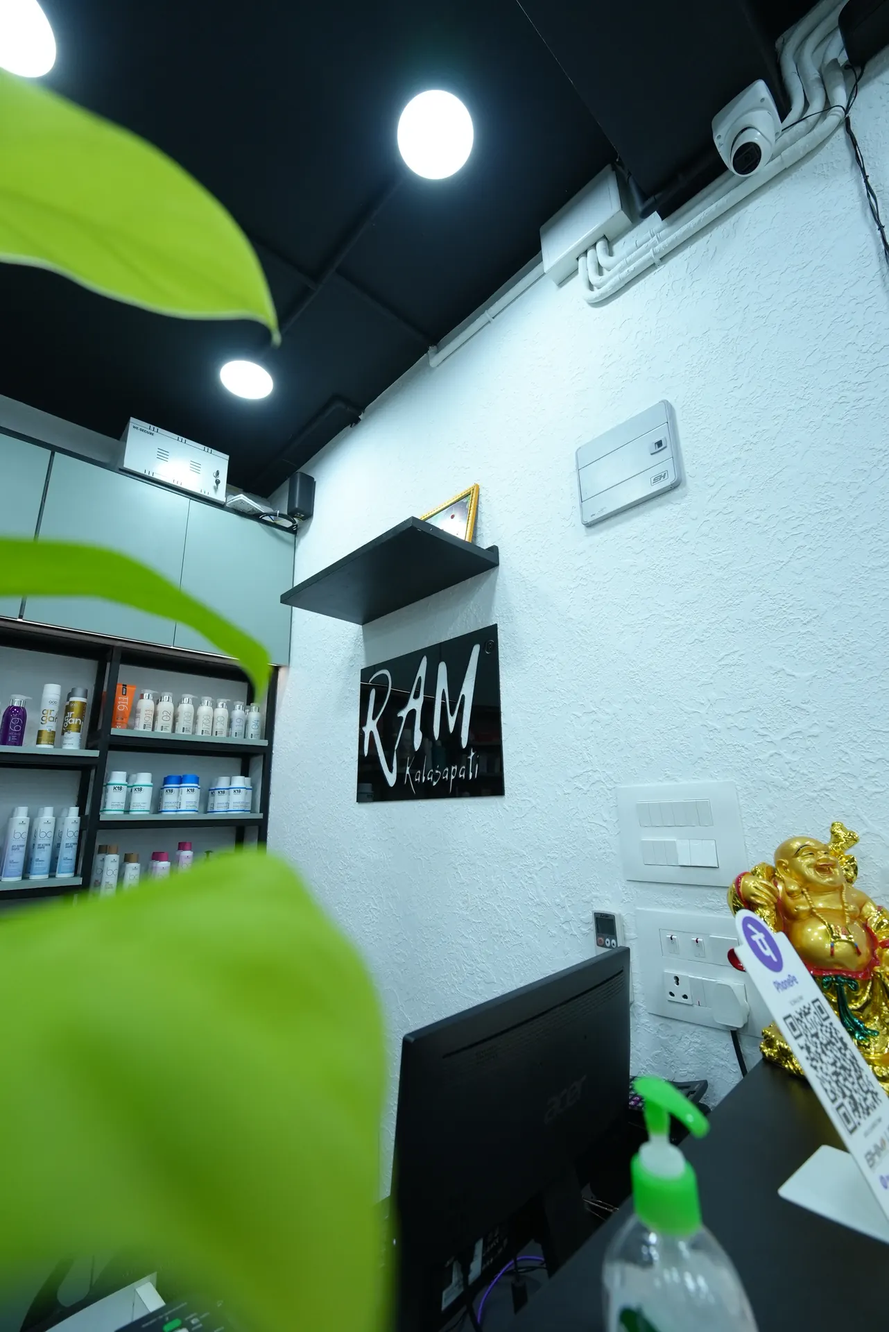 RAM KALASAPATI product display and logo wall