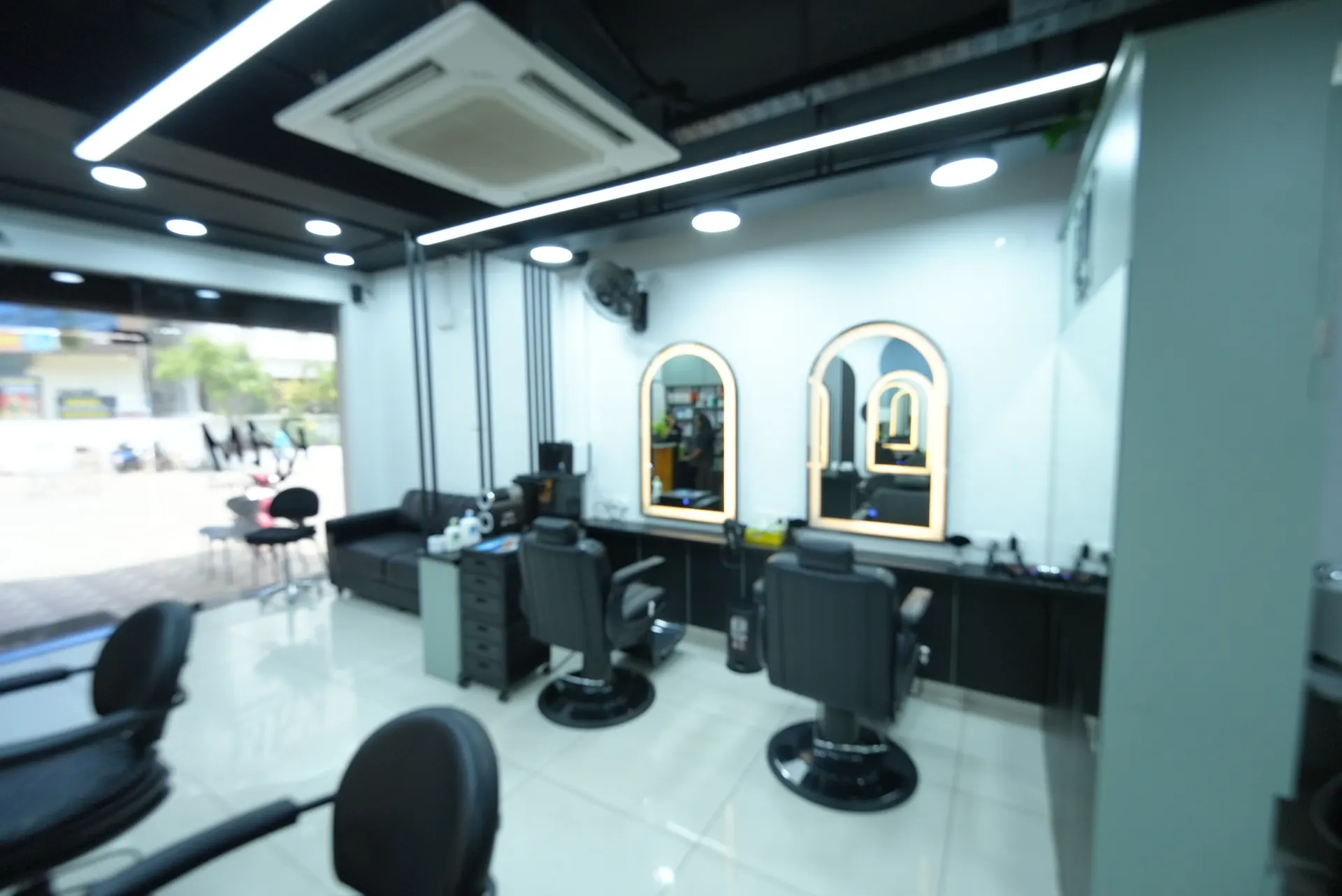 RAM KALASAPATI styling stations with illuminated arched mirrors