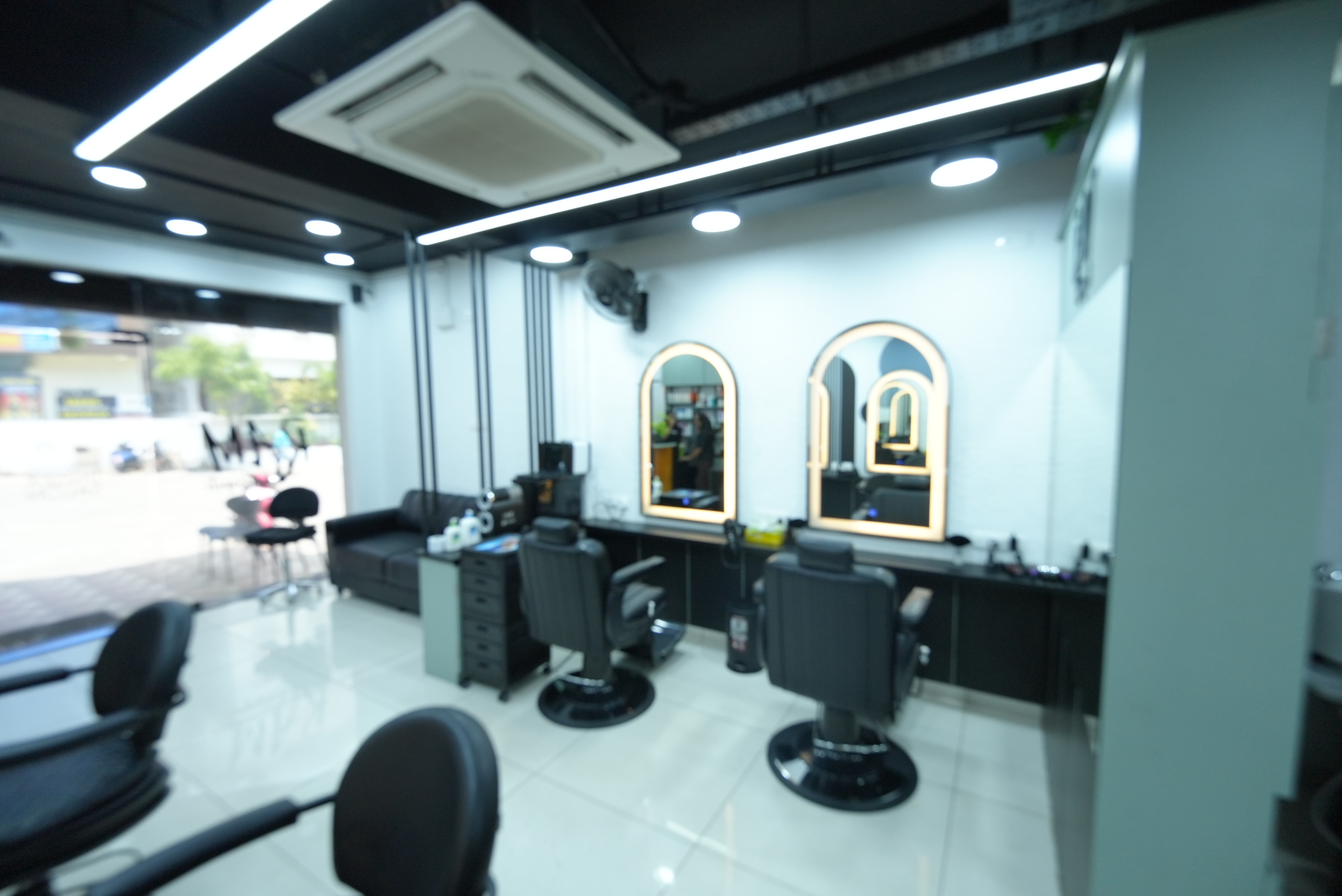 RAM KALASAPATI styling stations with illuminated arched mirrors